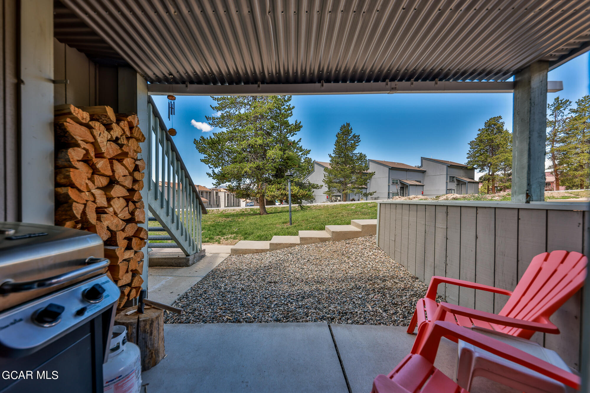 a view of a porch with furniture