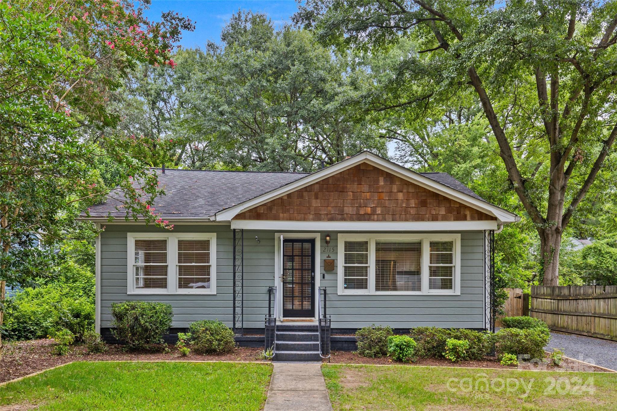 front view of a house and a yard