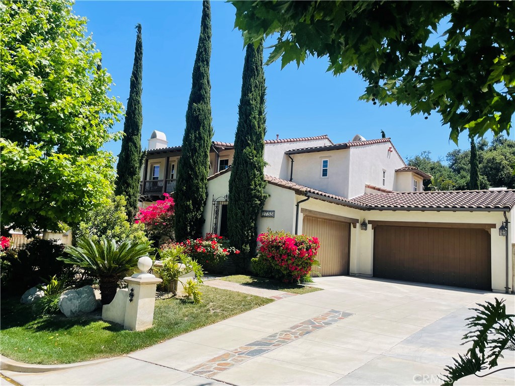 a front view of a house with a garage