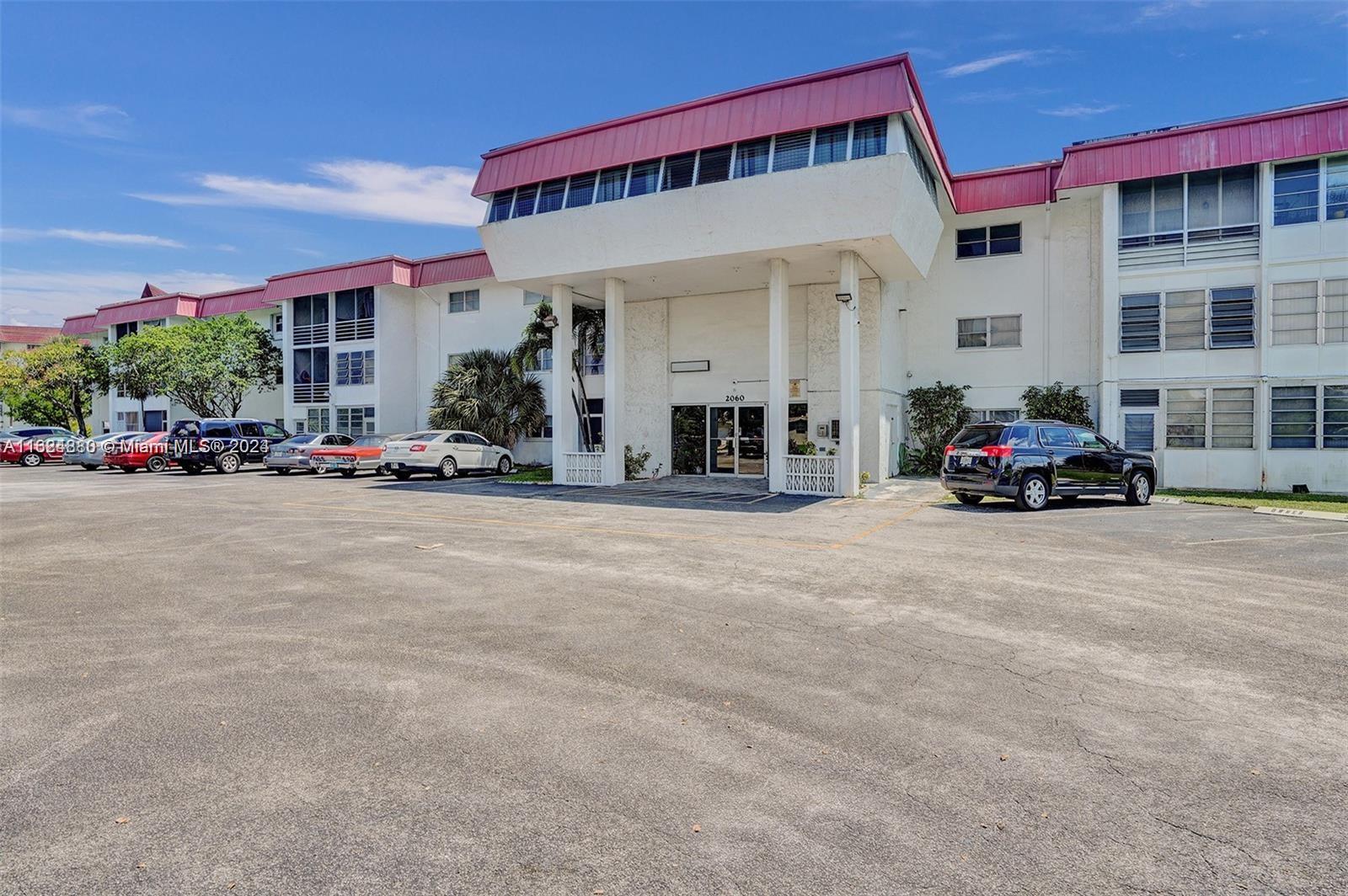 a cars parked in front of a building