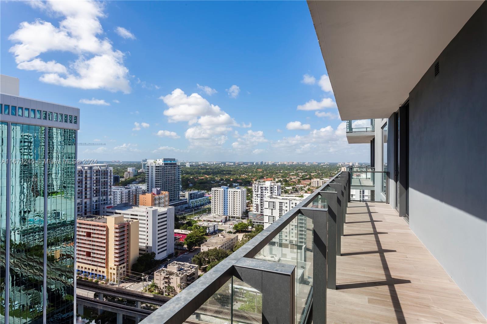 a view of a balcony with city view