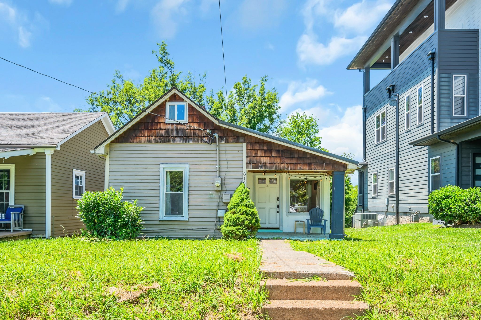 front view of a house with a yard