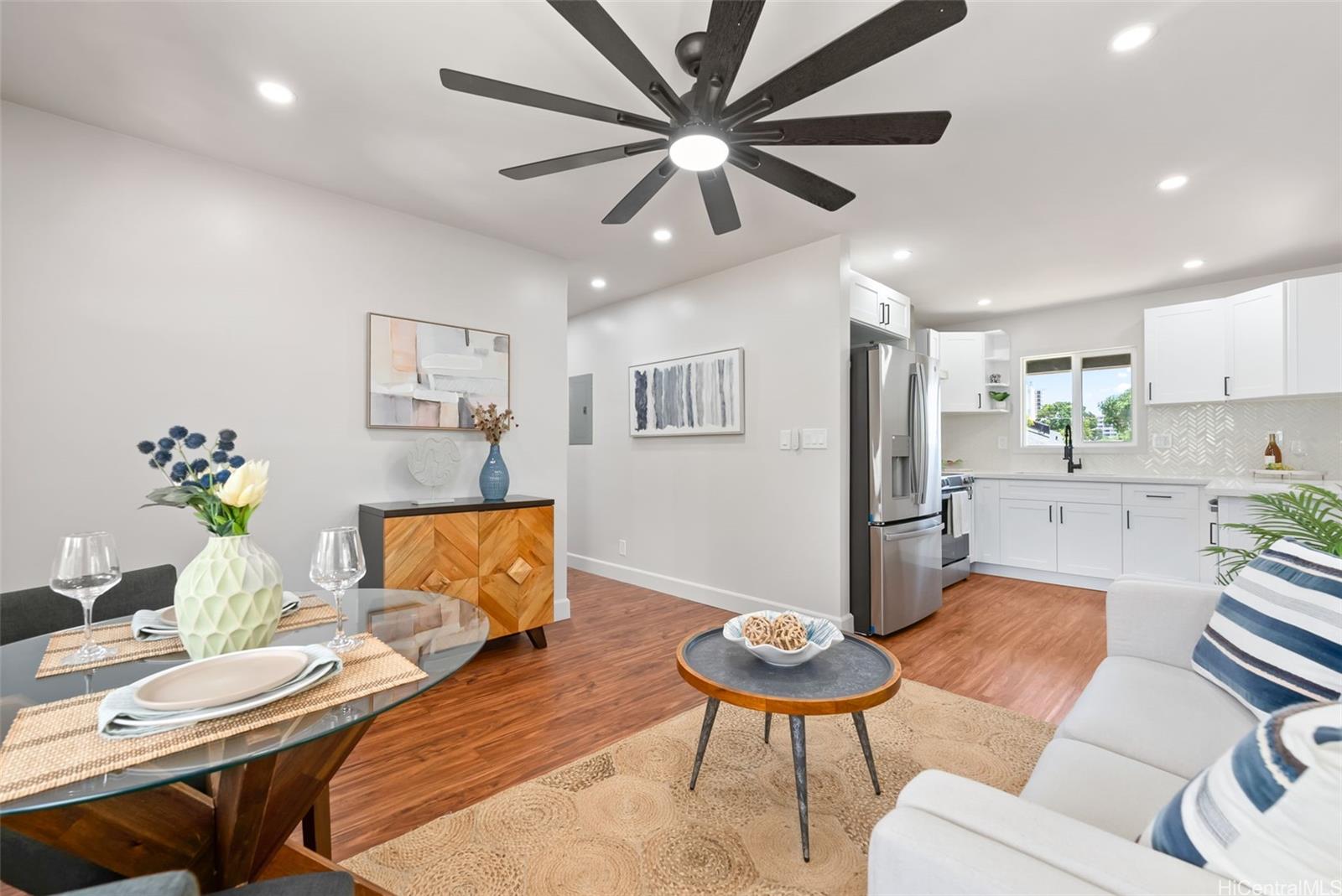 a living room with furniture and a table