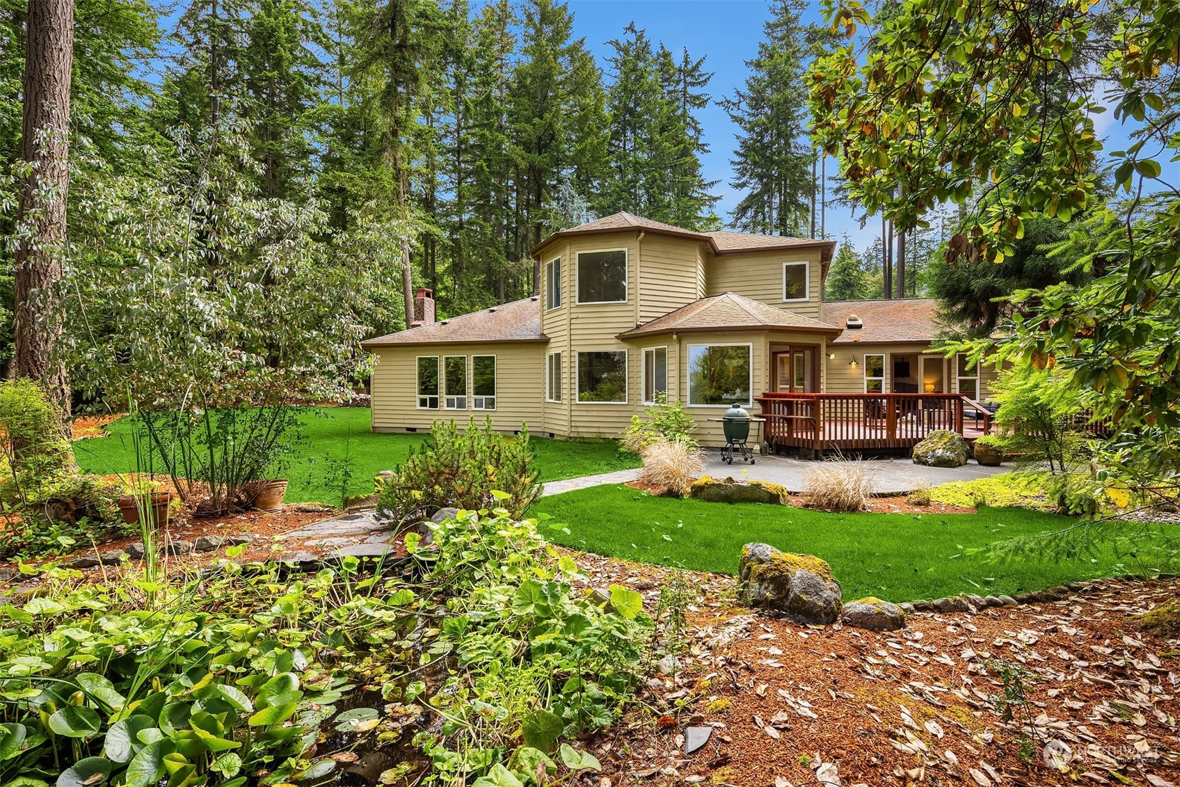 front view of a house with a yard