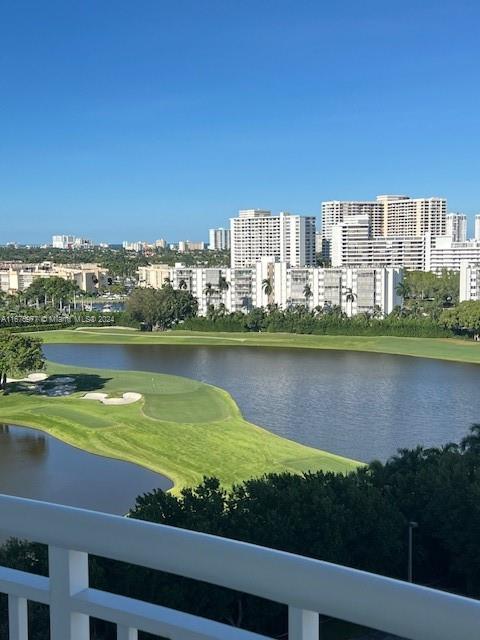 a view of a city with a lake