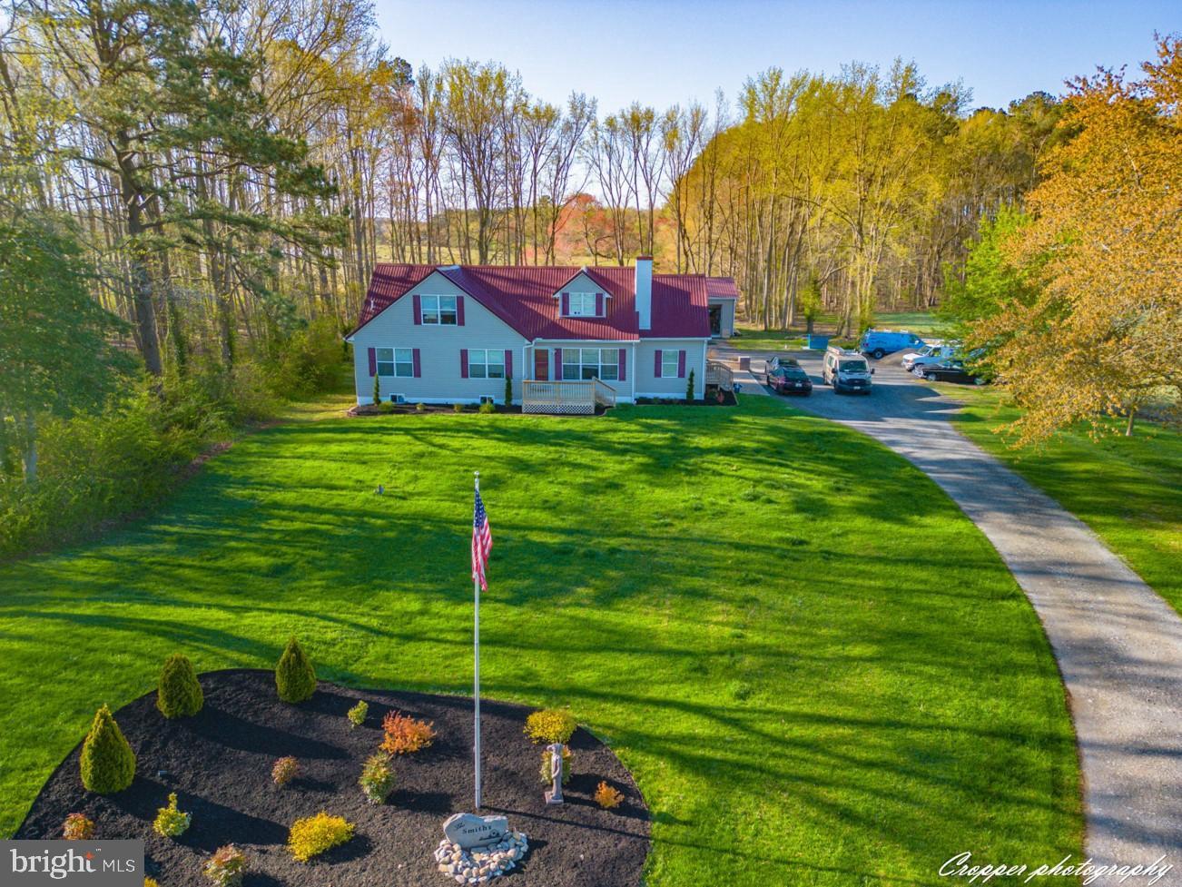 a view of a house with a big yard