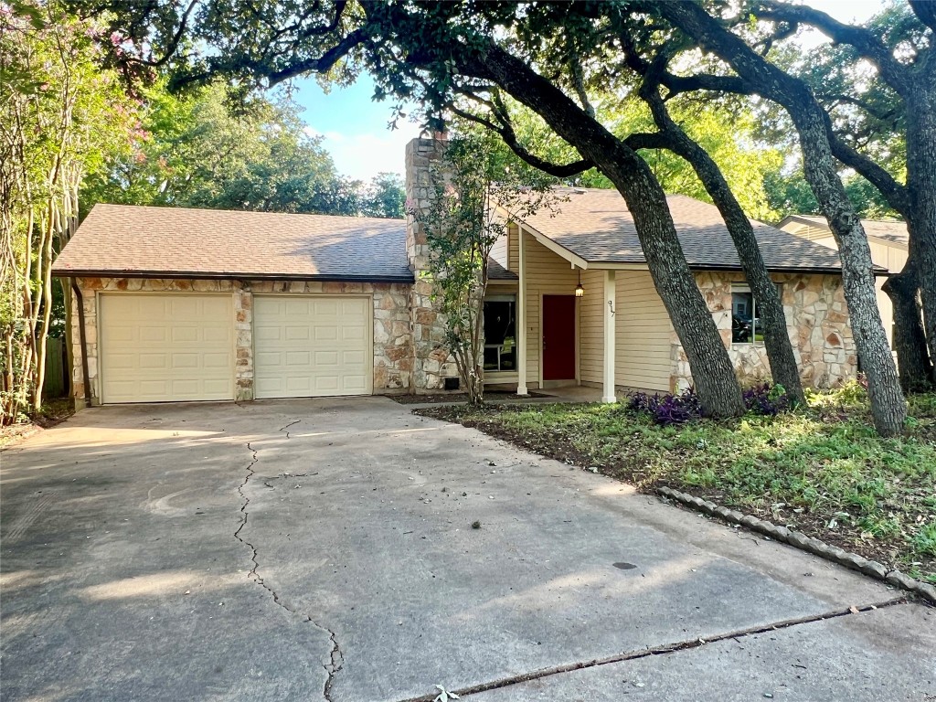 a house with trees in front of it