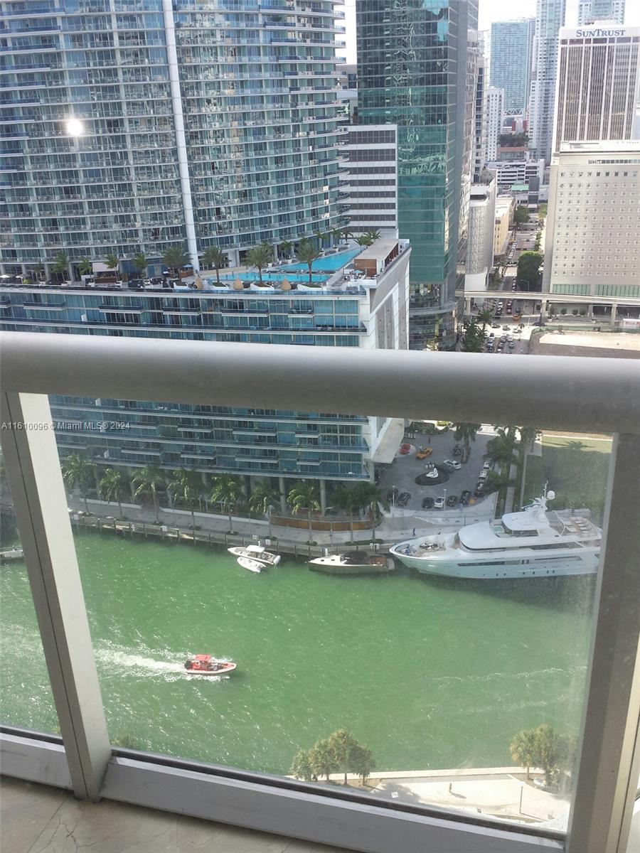 a view of swimming pool from a window