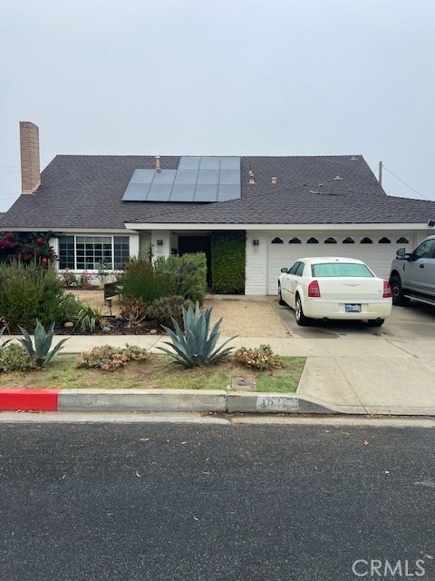 a car parked in front of a house