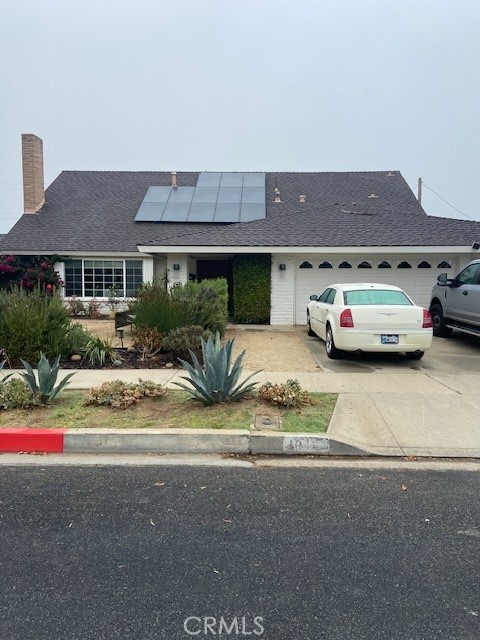 a car parked in front of a house