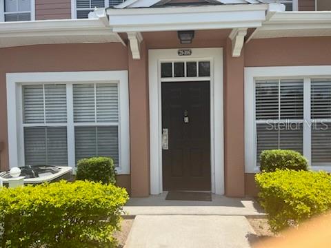 a view of a entryway door front of house