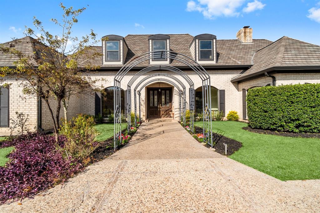 Beautiful entrance with future vine covered archway.