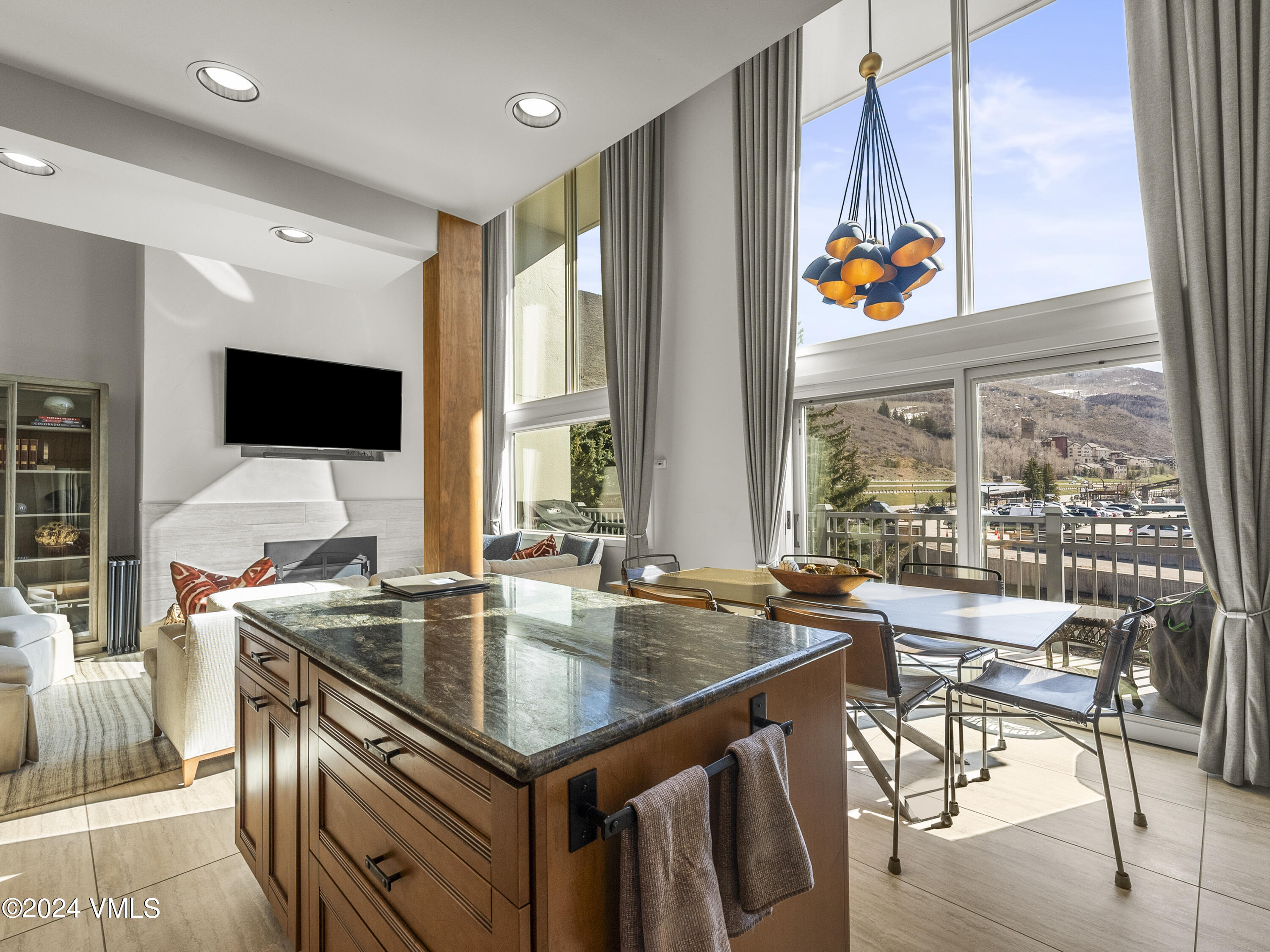 a kitchen with stainless steel appliances a sink and a stove