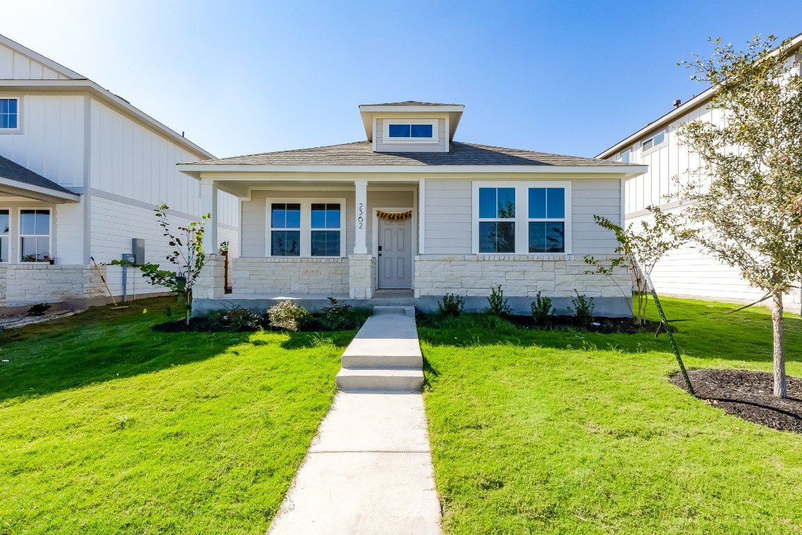 a front view of house with yard