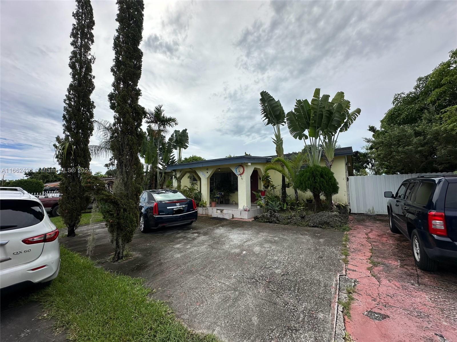 a car parked in front of a house