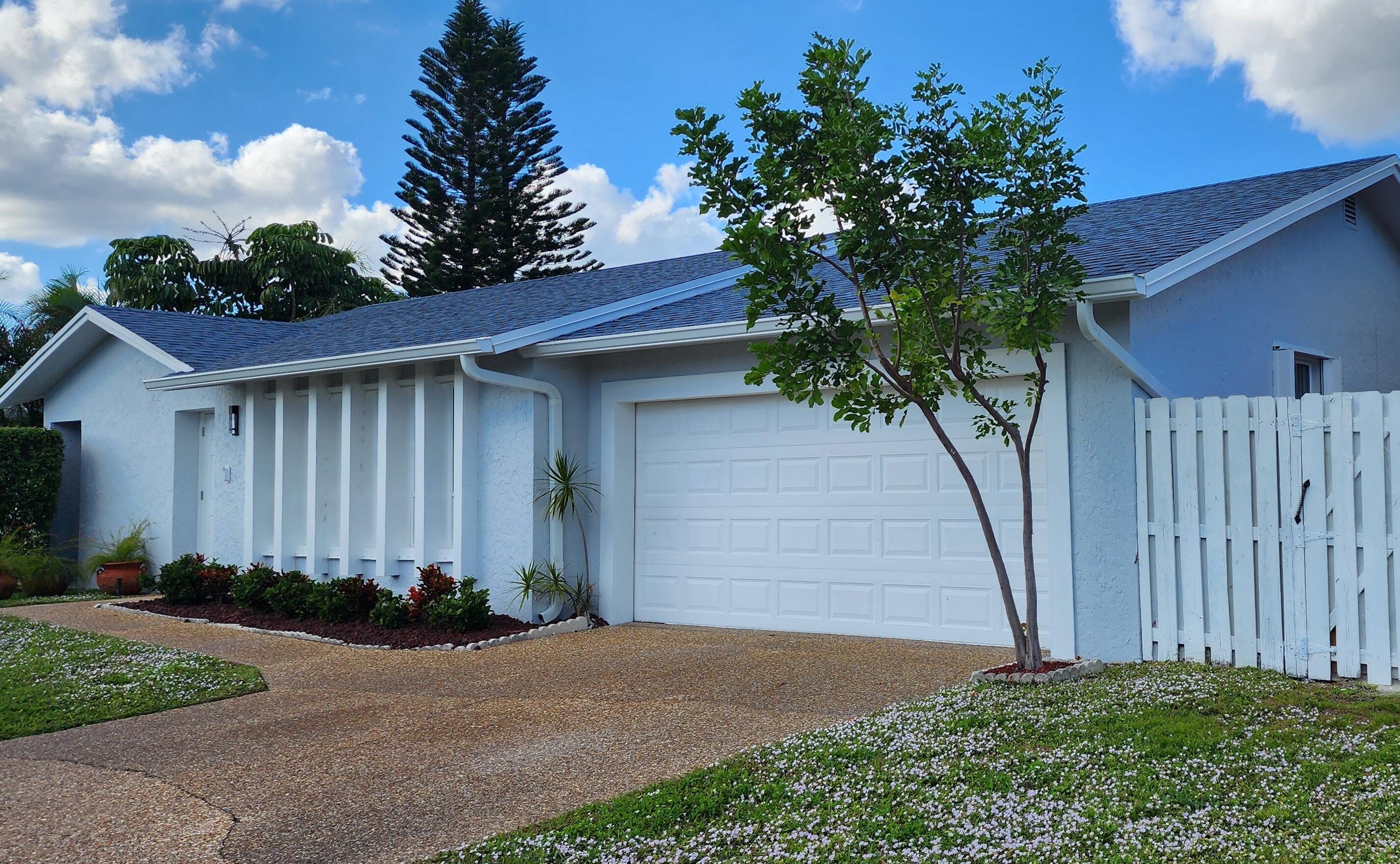 a front view of a house having yard