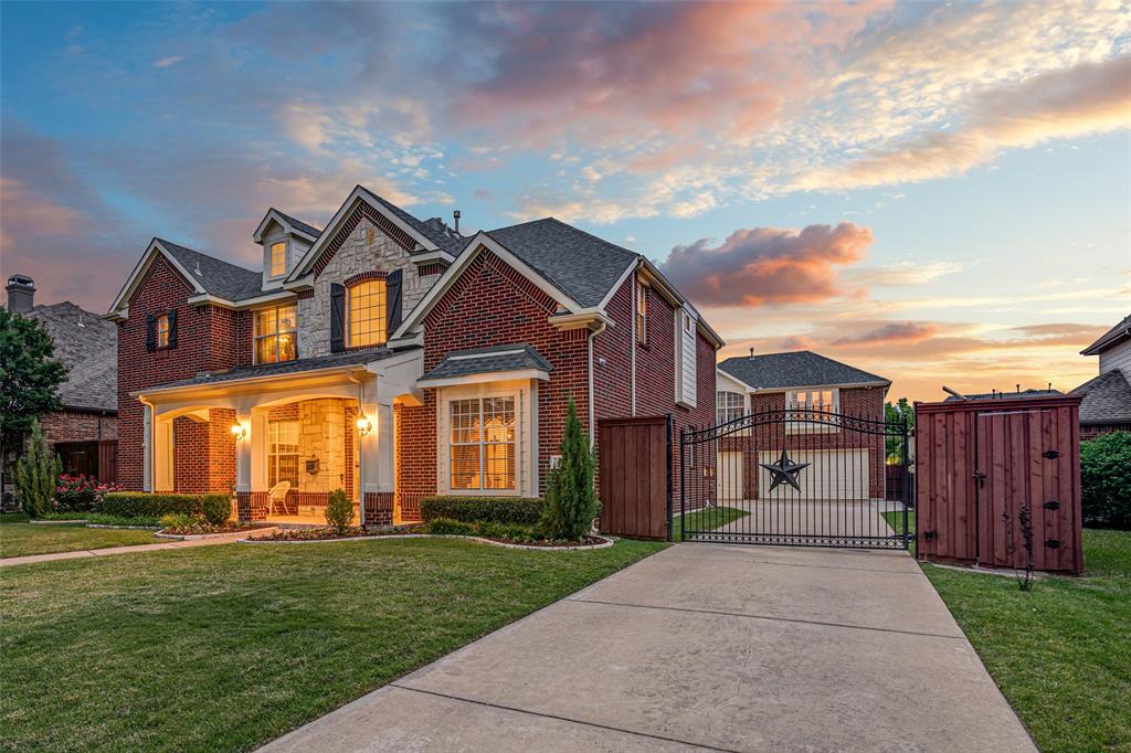 front view of a house with a yard