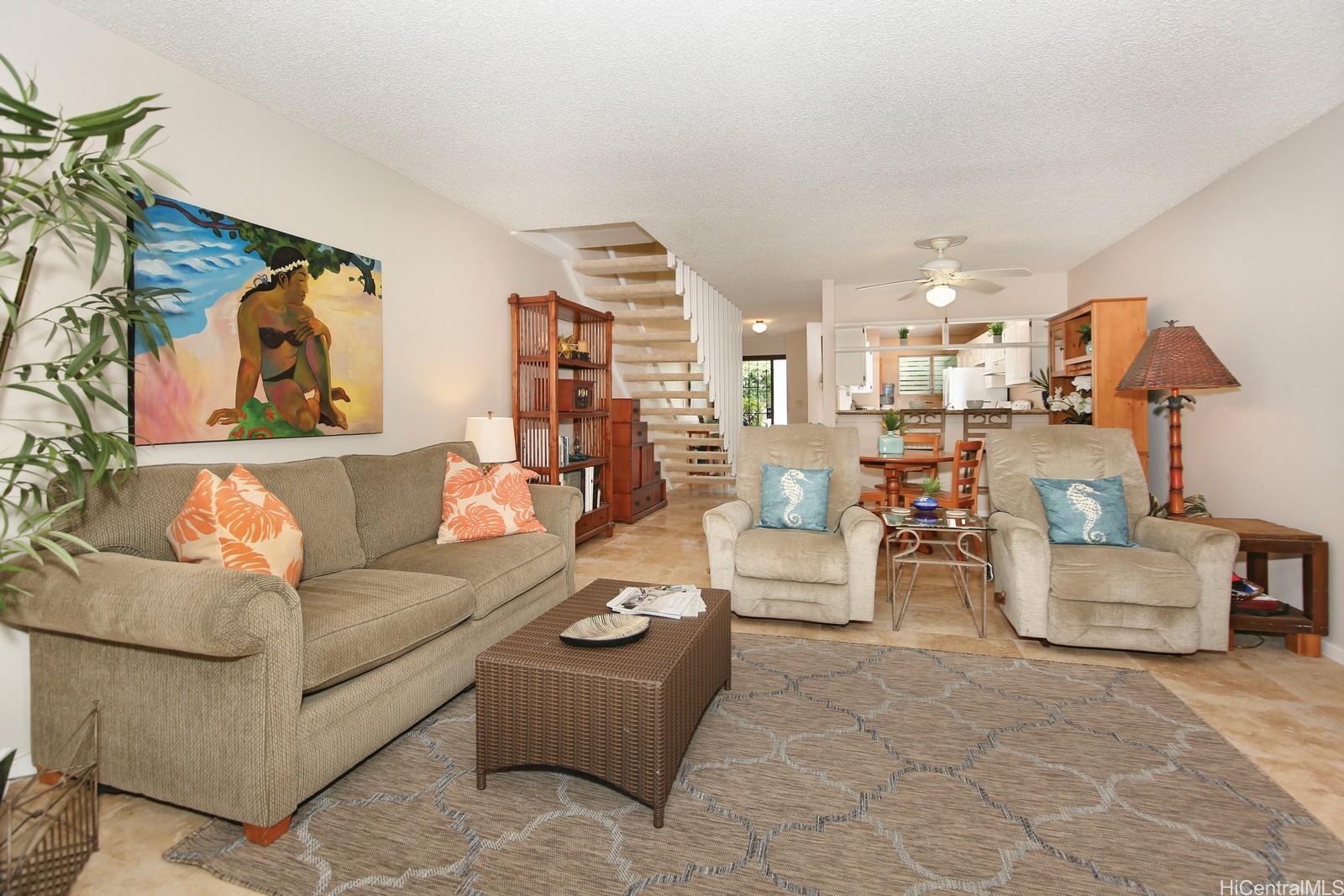 a living room with furniture and a couch