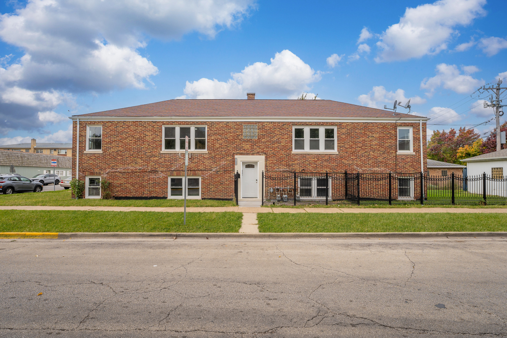 a front view of house with outdoor space and yard