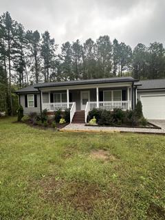 front view of house with a yard