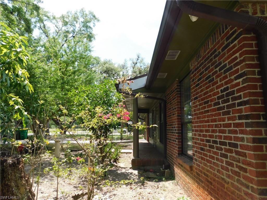 a view of path along with house and trees