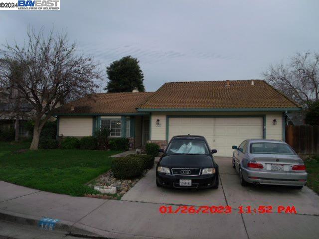 a car parked in front of a house