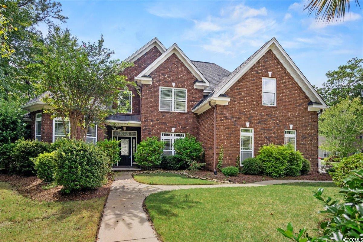 View of front of home with a front lawn