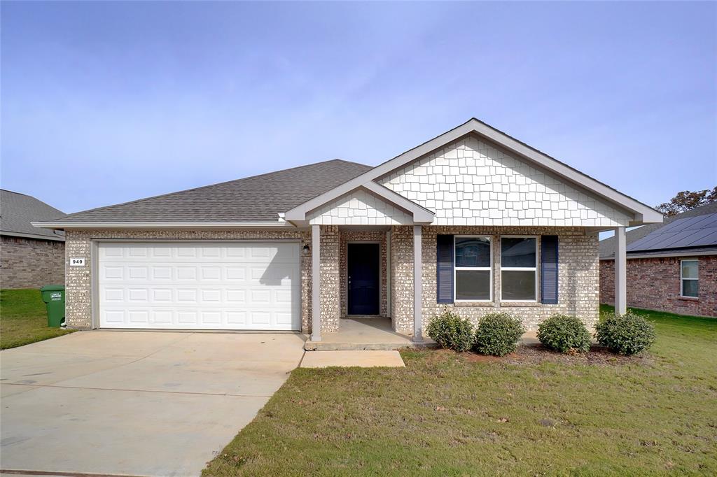 front view of a house and a yard