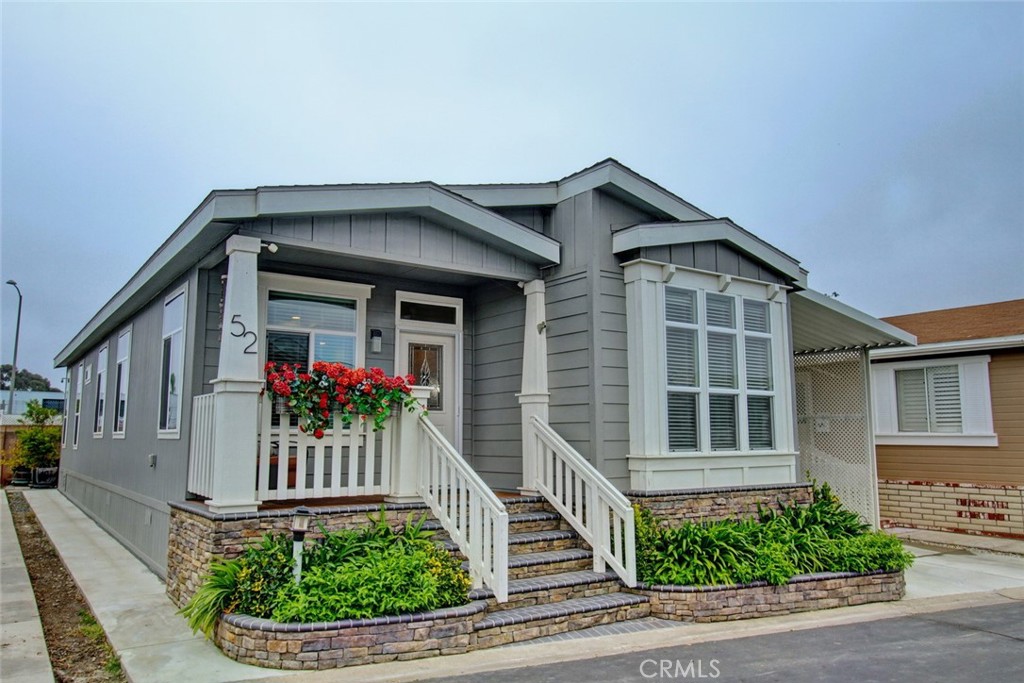 a front view of a house with porch