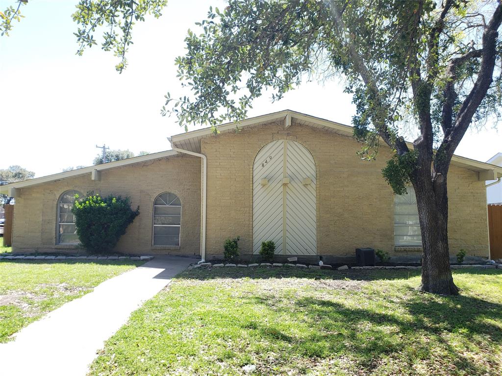 a house with trees in front of it