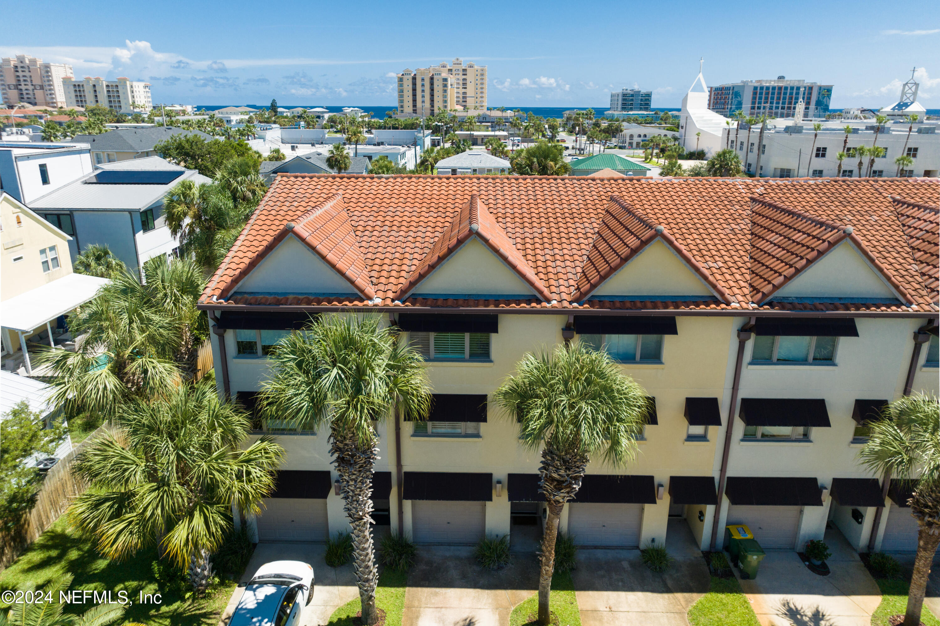 a aerial view of a house with a yard