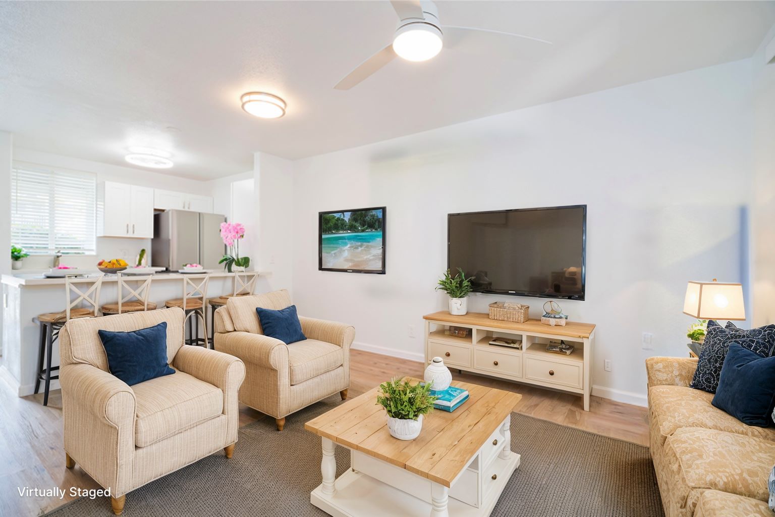 a living room with furniture and a flat screen tv