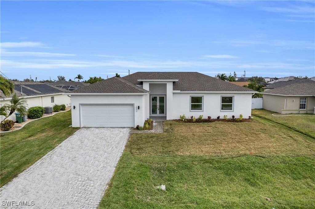 front view of a house with a yard