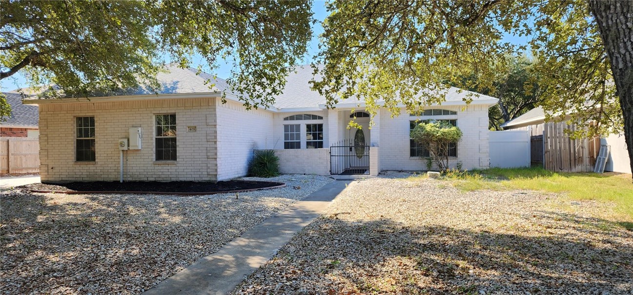 a front view of house with yard