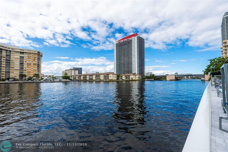 a view of a lake with a large building