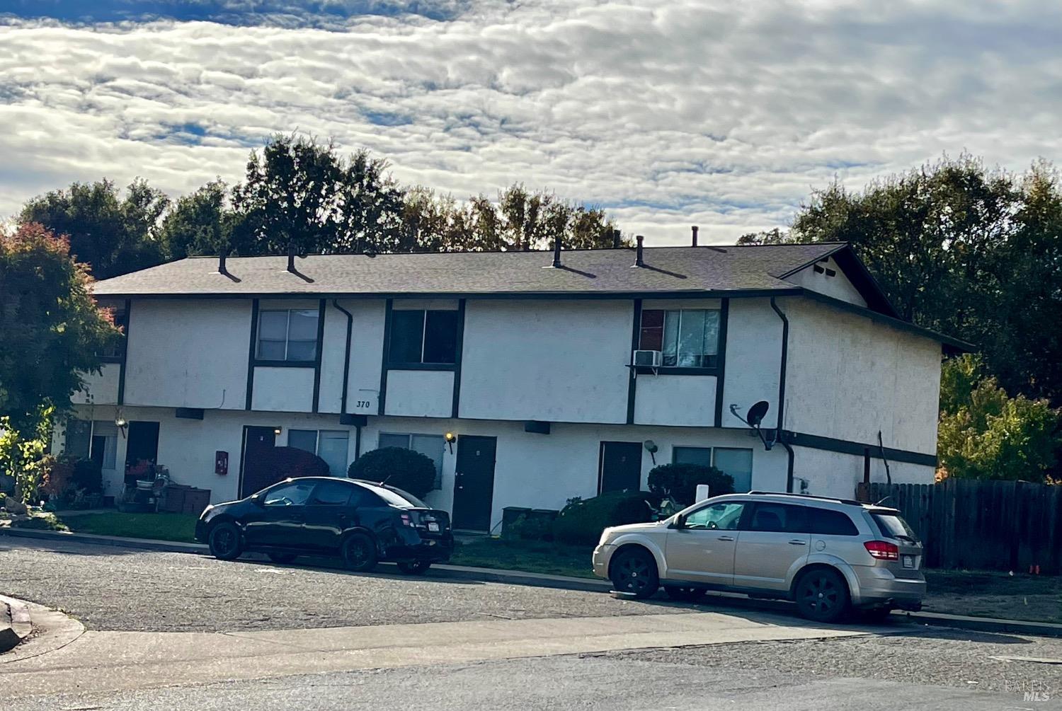 a car parked in front of a house