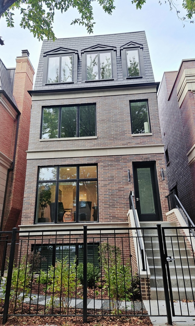 front view of a house with a balcony