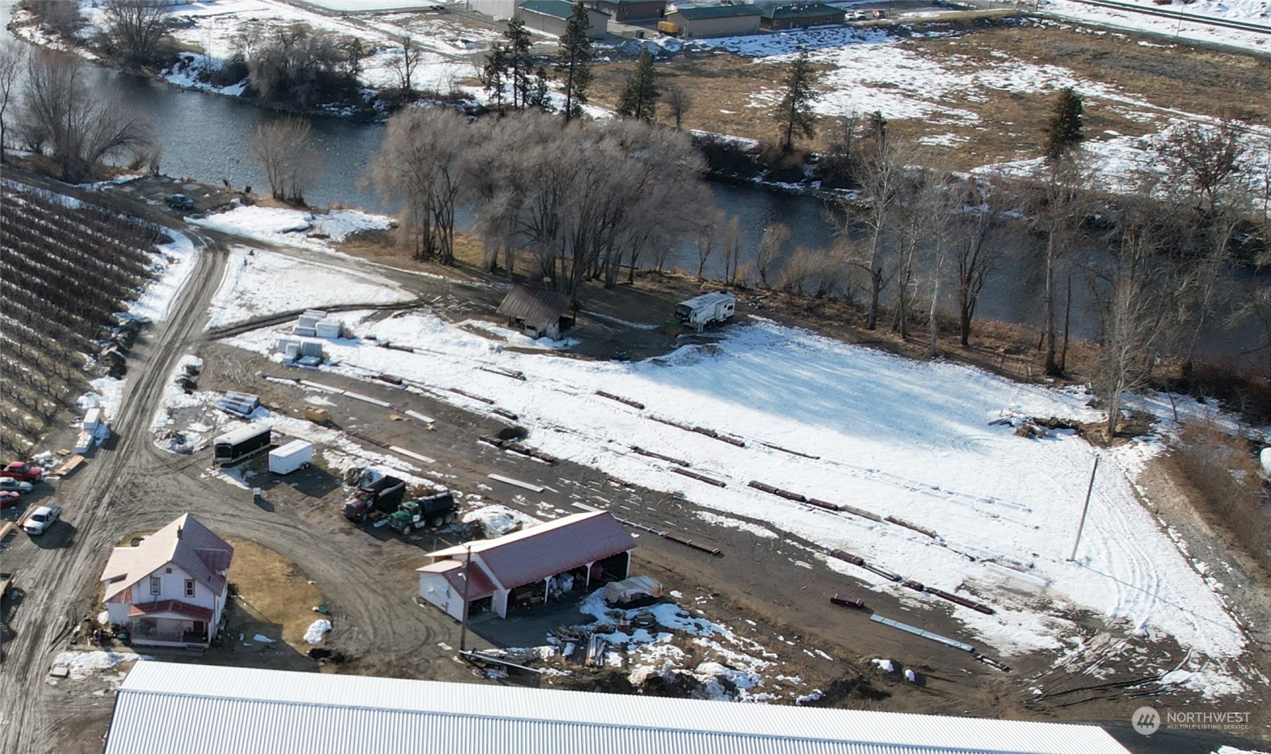 an aerial view of house with yard