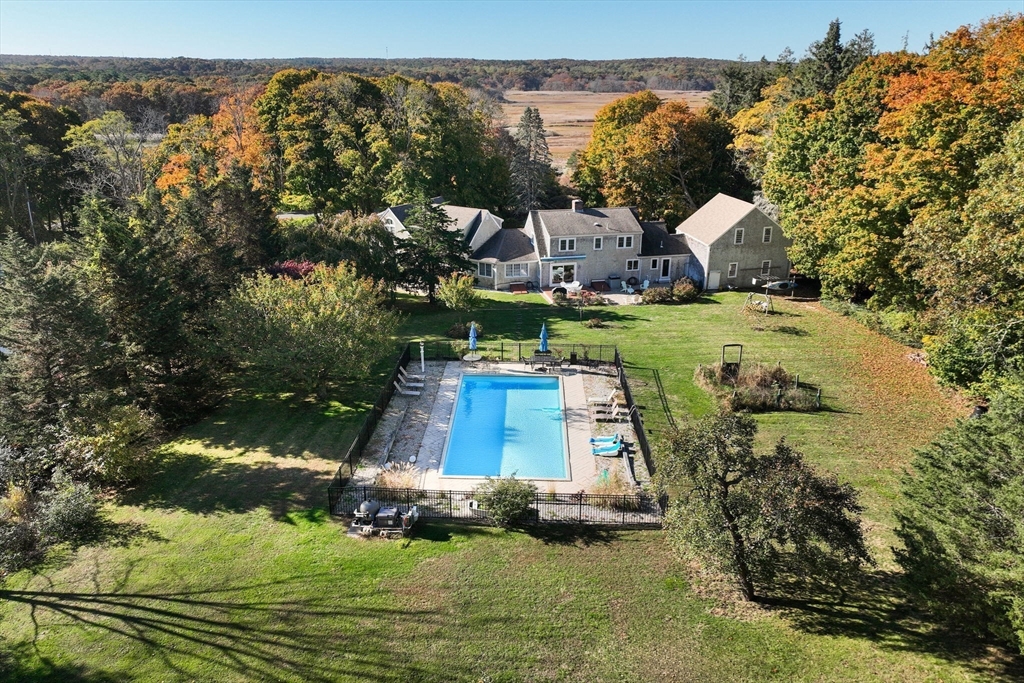 a view of a lake with a yard