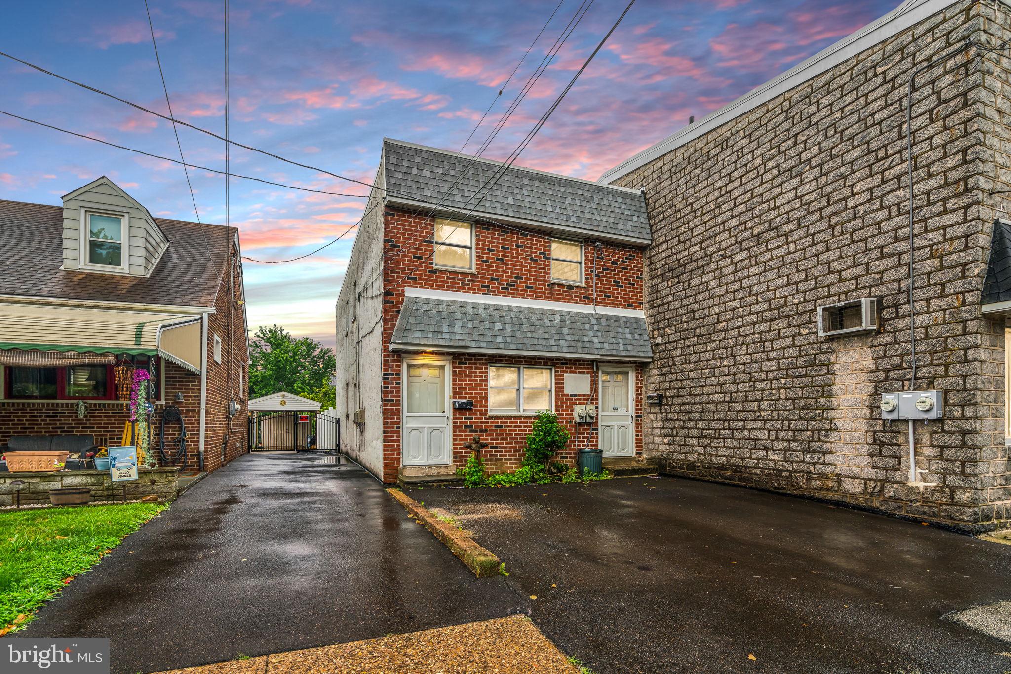 a view of a building with a yard