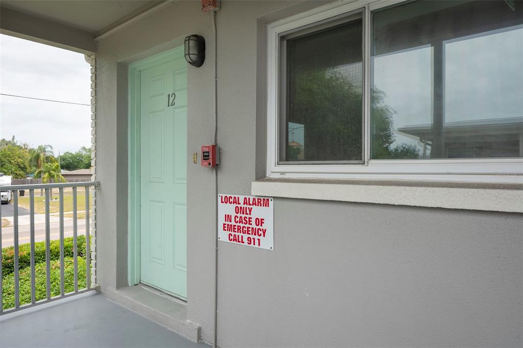 a view of a door and a window