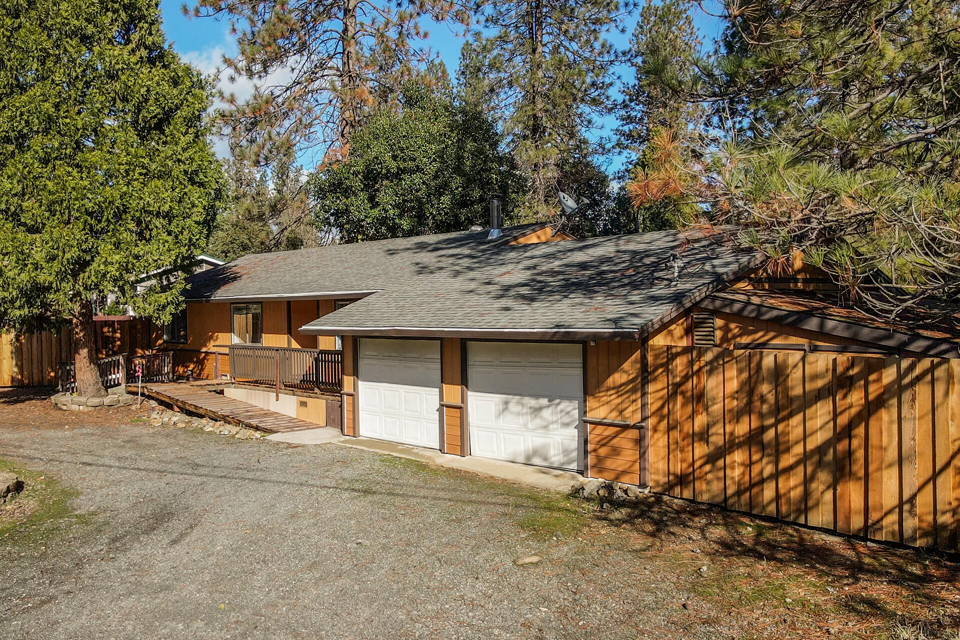 a view of a house with a tree