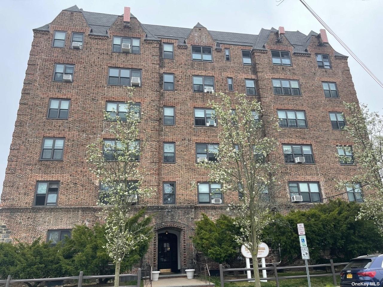 a large brick building with a large windows