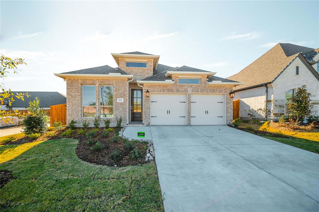 a front view of house with an outdoor space and seating