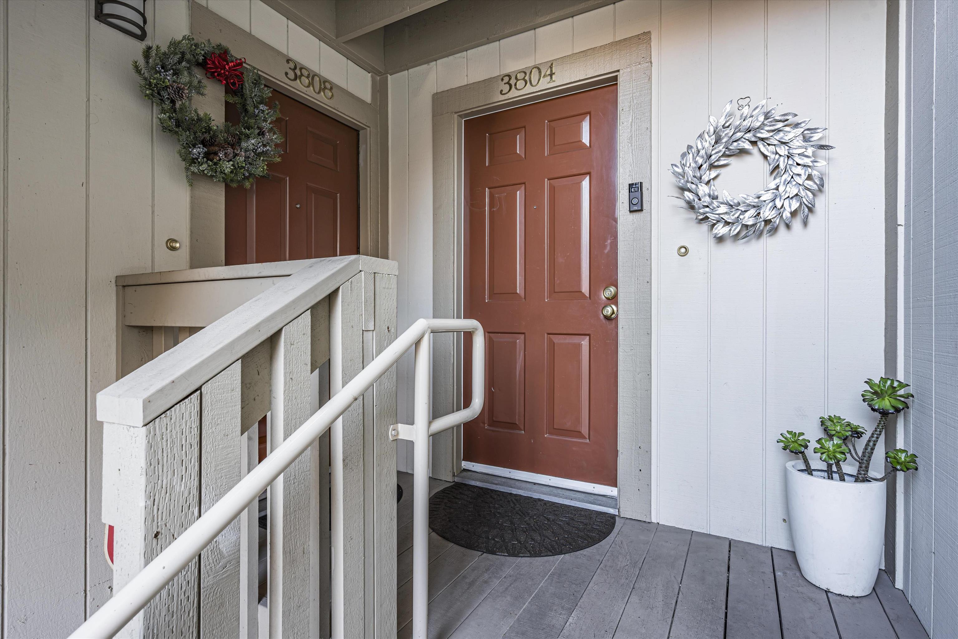 a view of entryway with wooden floor