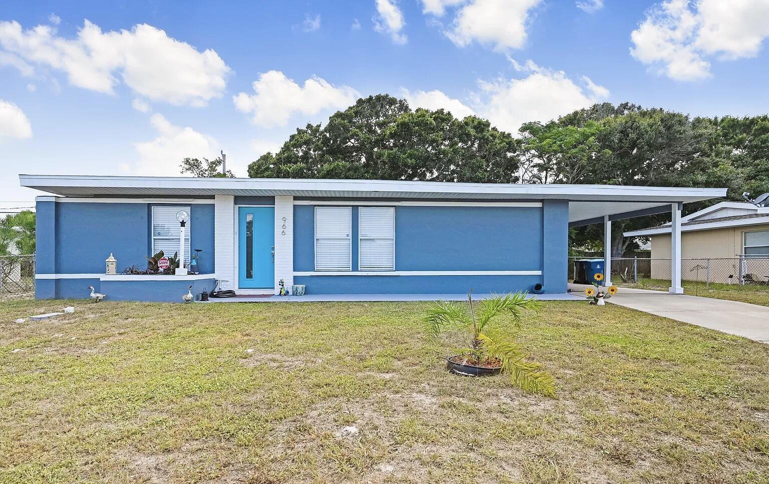 front view of a house with a swimming pool