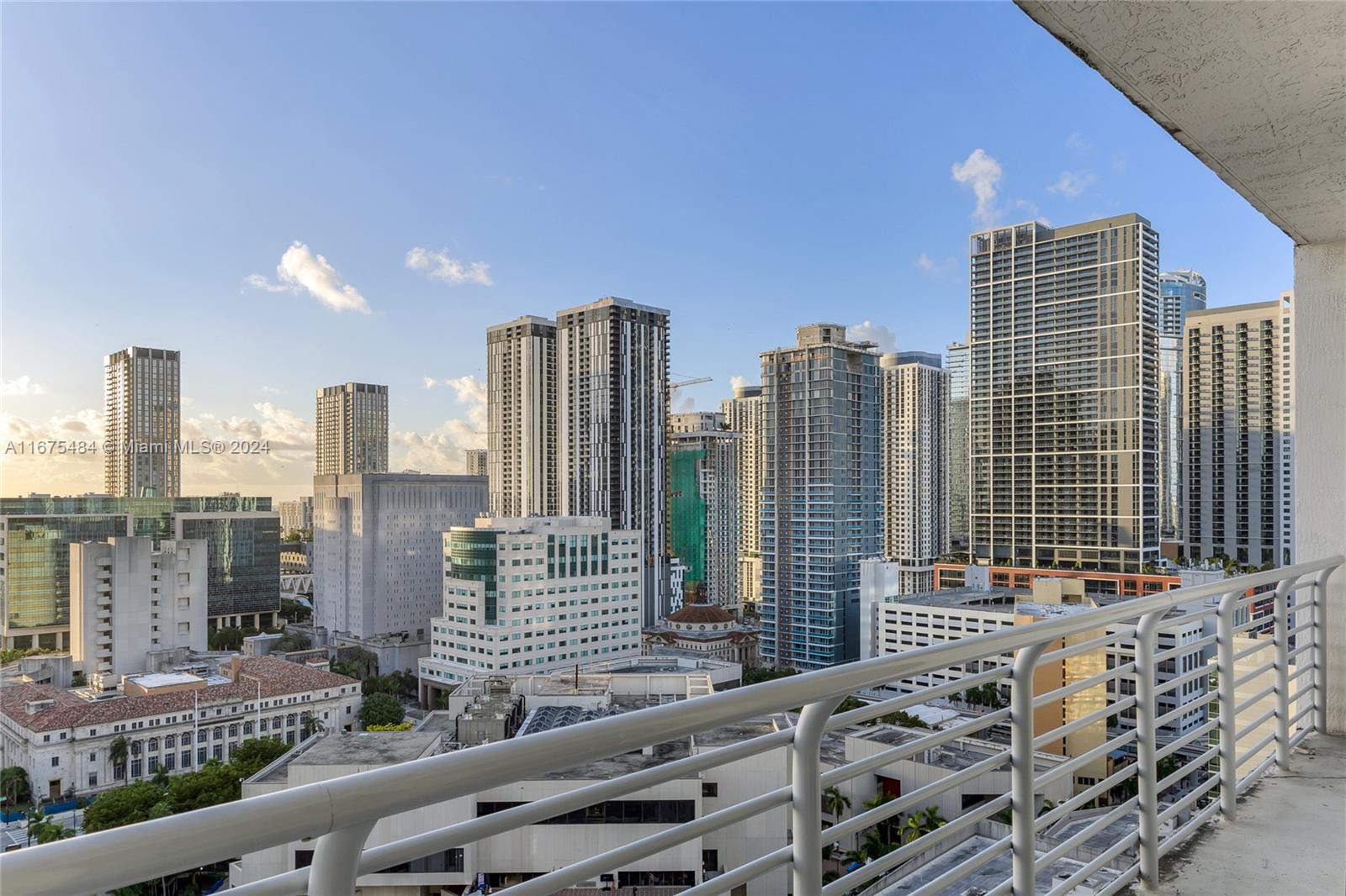 a view of city with tall buildings