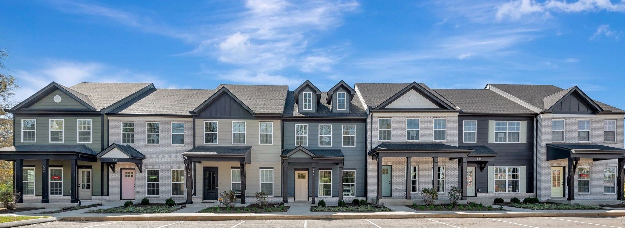 a front view of residential houses