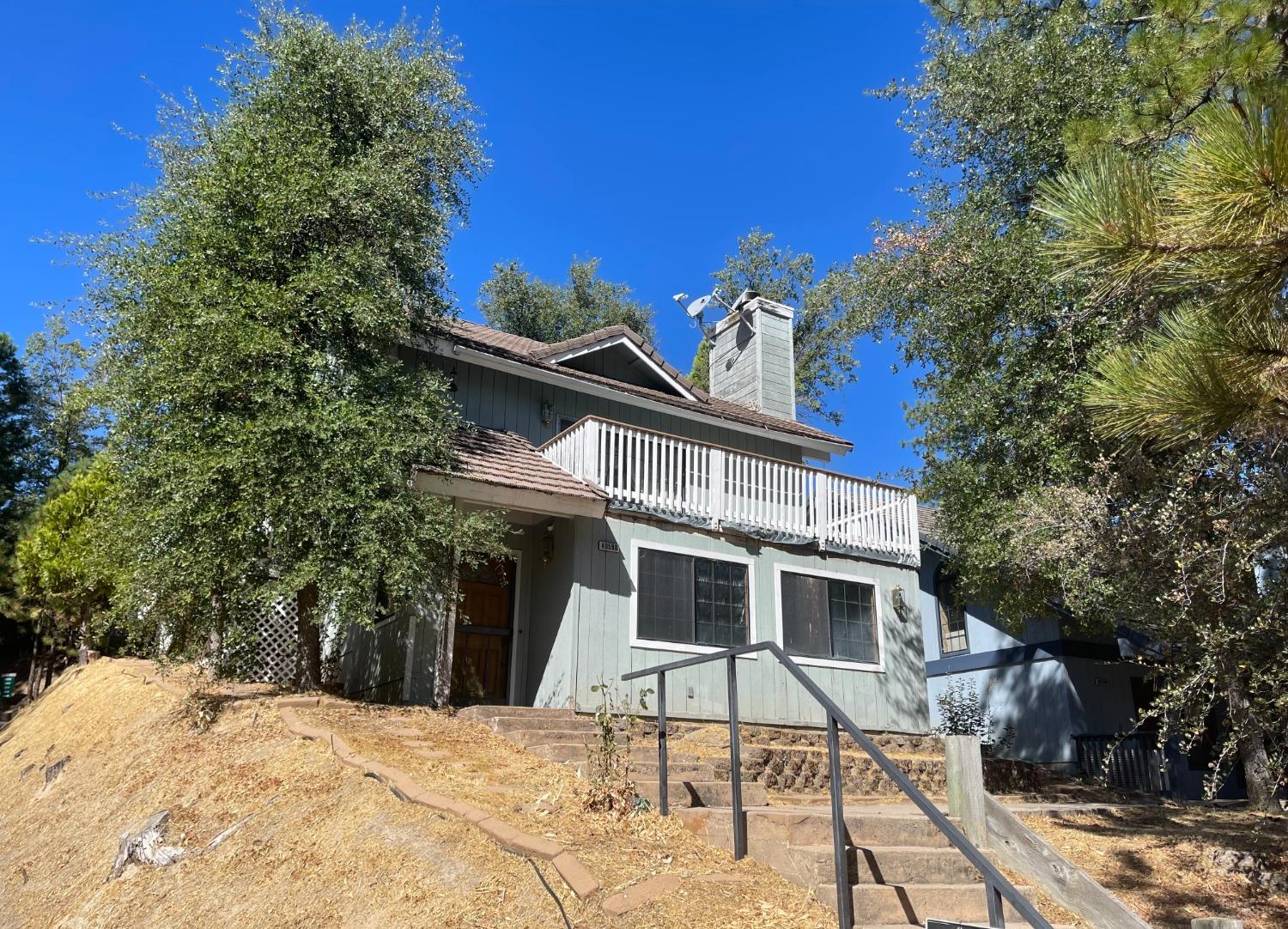 a view of a house with a trees