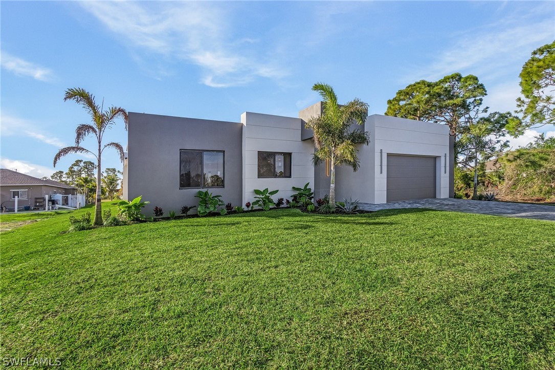 a front view of house with yard